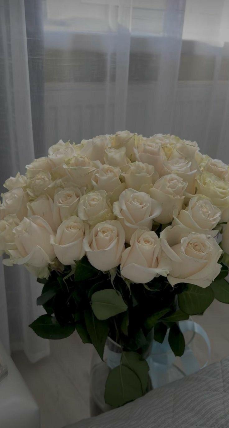 Professional floral arrangement in modern corporate setting